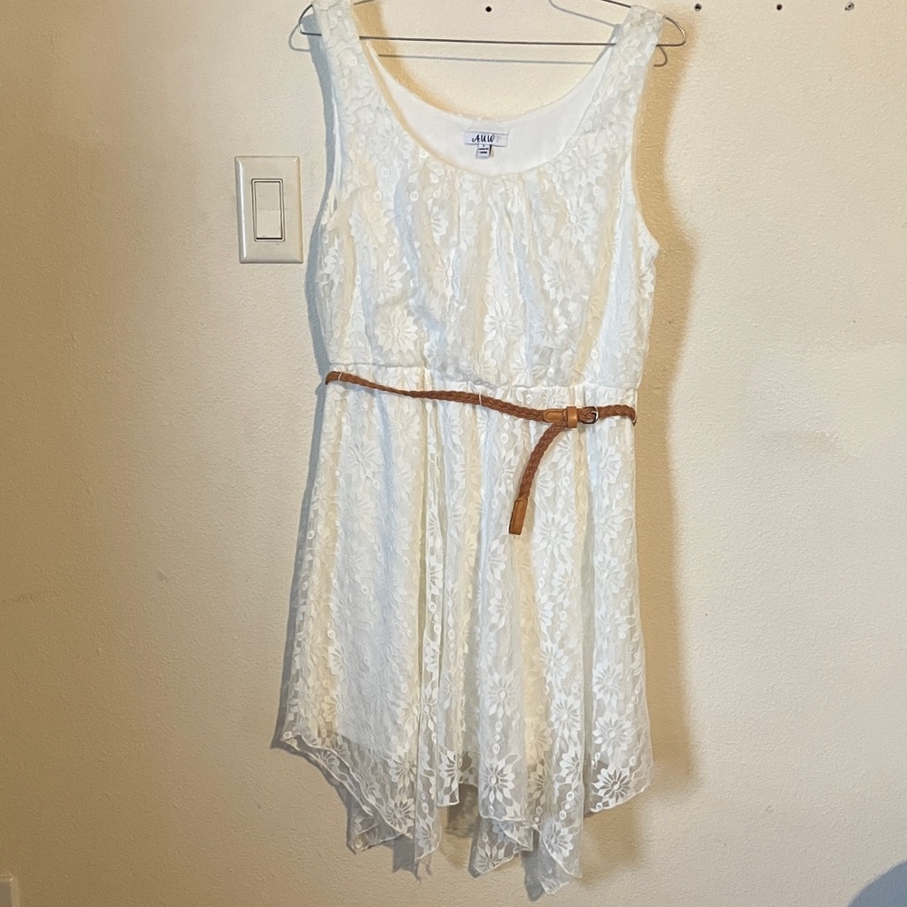 Sleeveless White Lace Mini-Dress with Brown Belt and Flowing Skirt